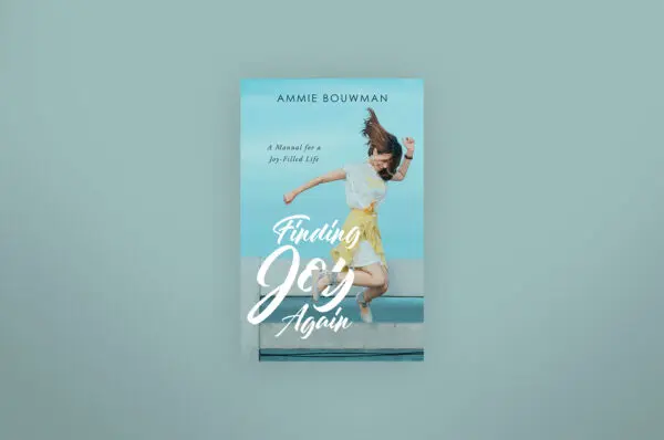 A book cover with a girl jumping in the air.