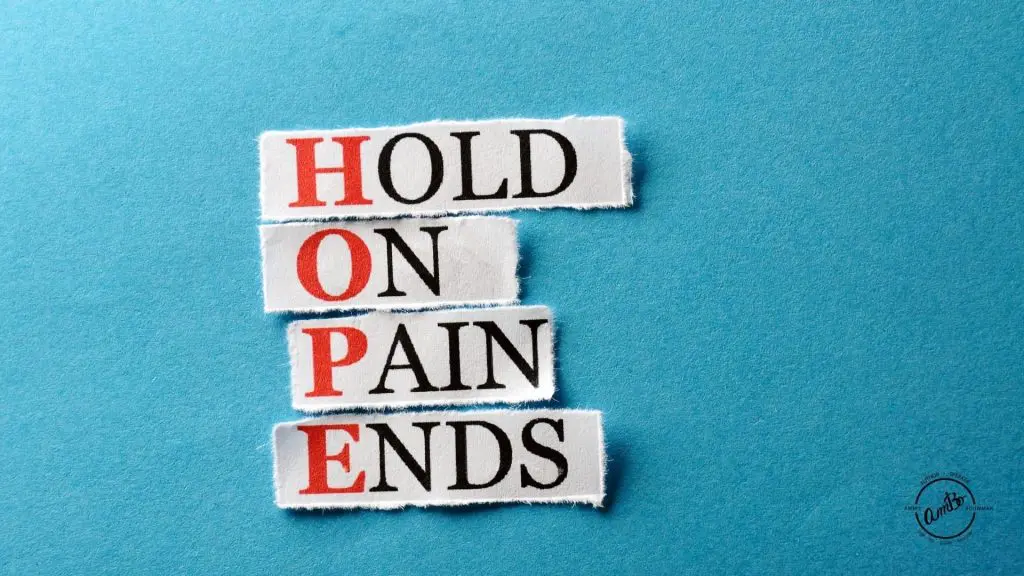 A blue background with the words hope and hold on pain ends.