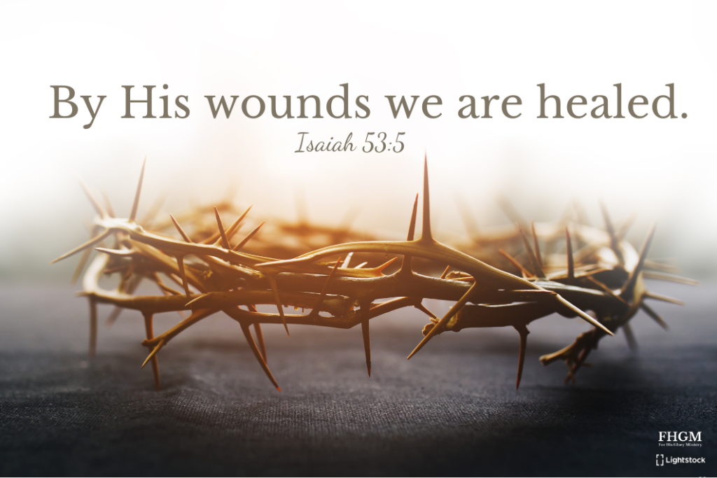 A crown of thorns with the words " his wounds we are healed."