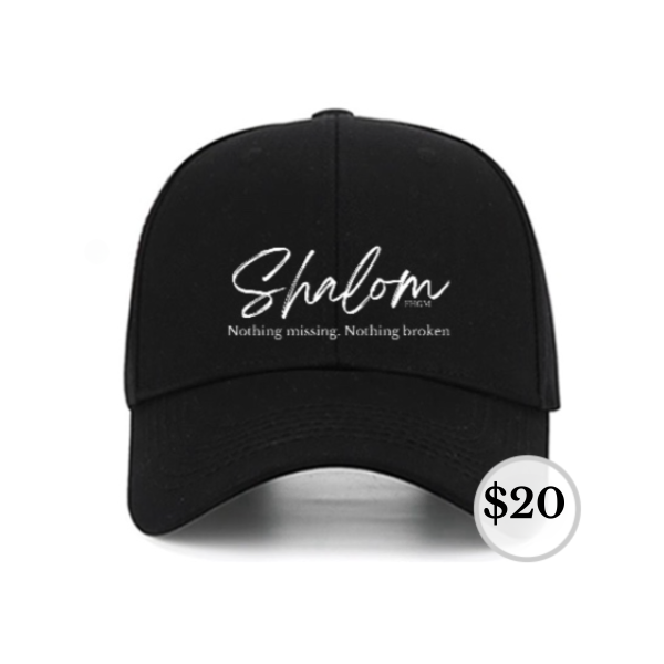 A black hat with the word shalom written on it.